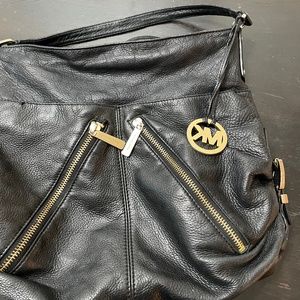 Michael Kors leather bag with diagonal zippers boho style